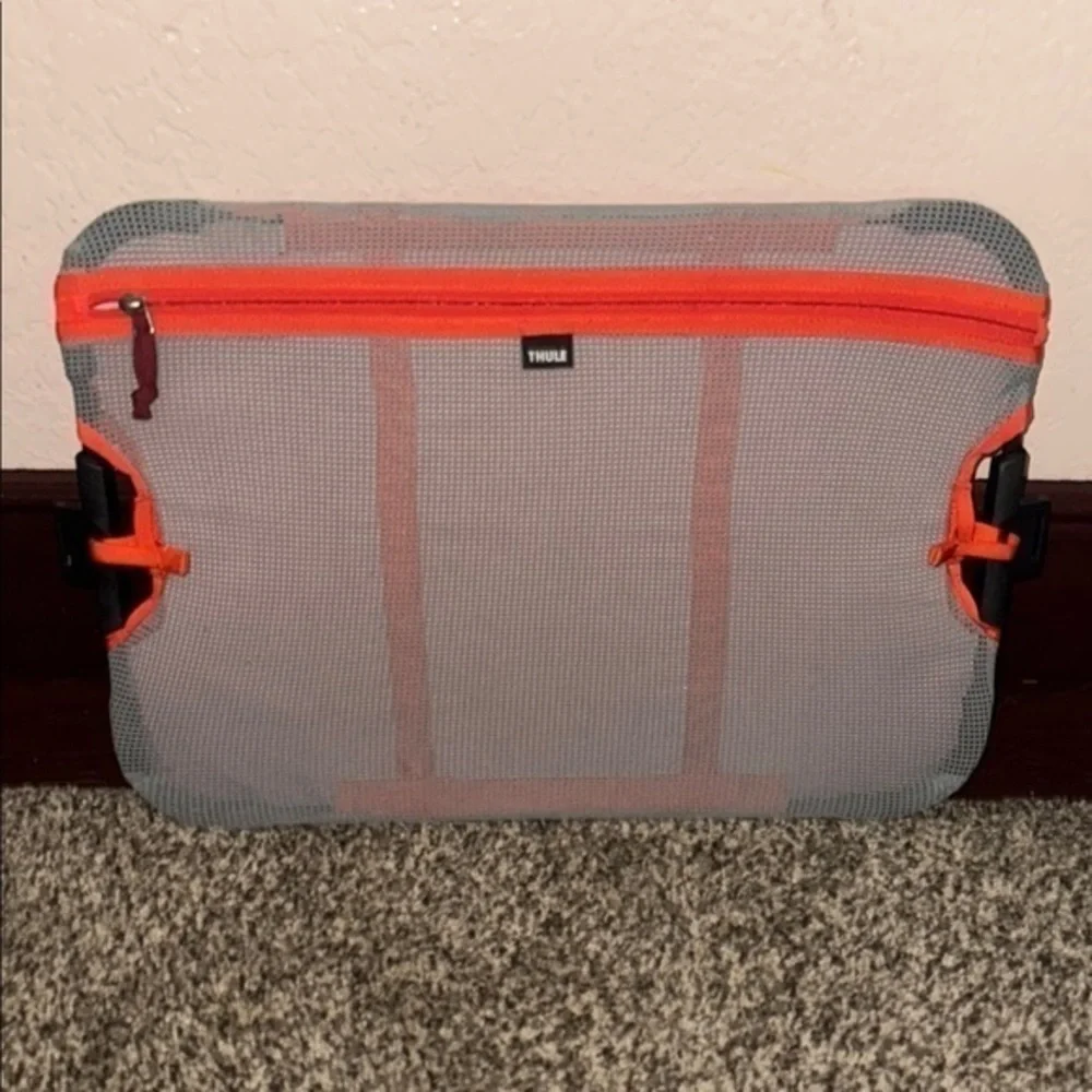Thule Gray and Orange Pocket for Thule Suit Case. Excellent used condition